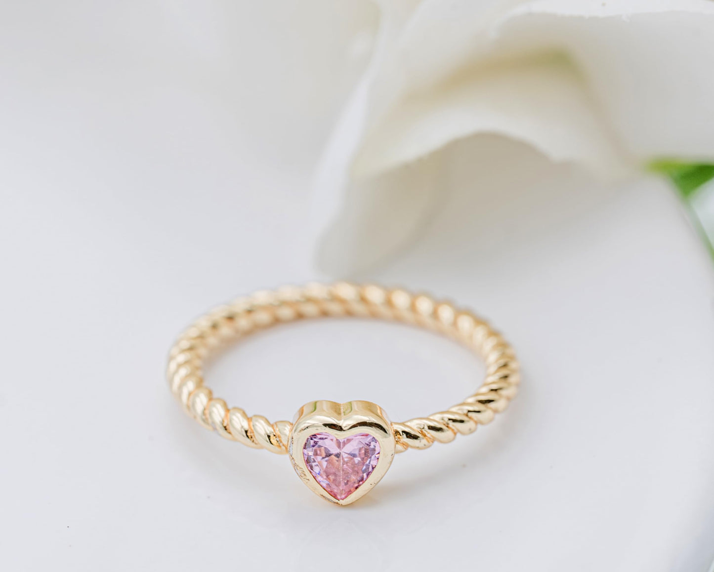 Bague pour bébé en forme de cœur rose